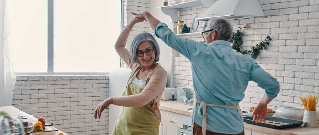 couple dancing in kitchen