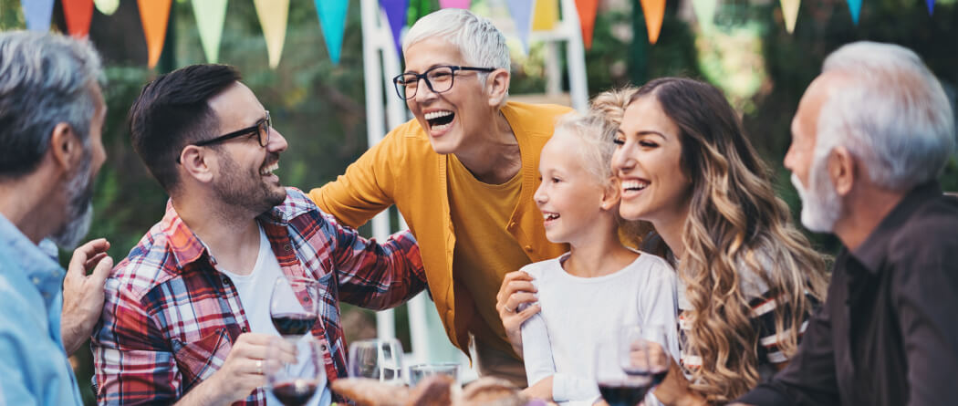 family at table laughing