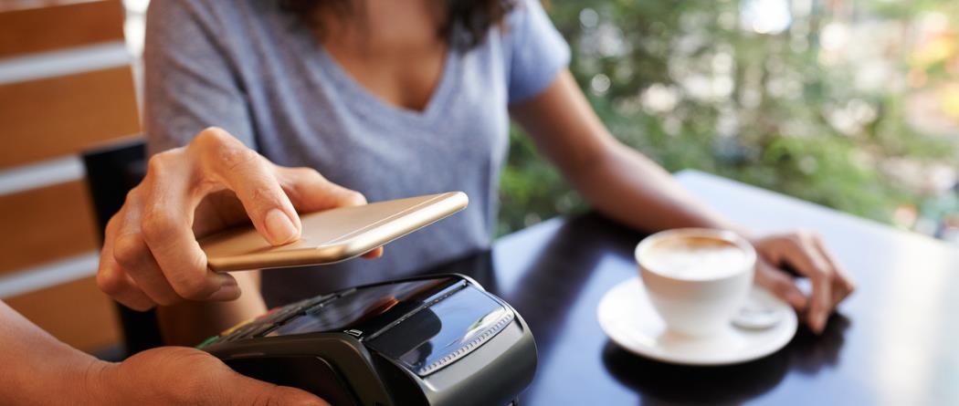 woman paying with digital wallet